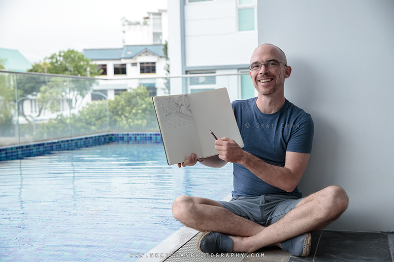 Artist sketching photoshoot session with Jerome Cheze at poolside (One Robey) Artist sketching photoshoot session with Jerome Cheze at poolside (One Robey)